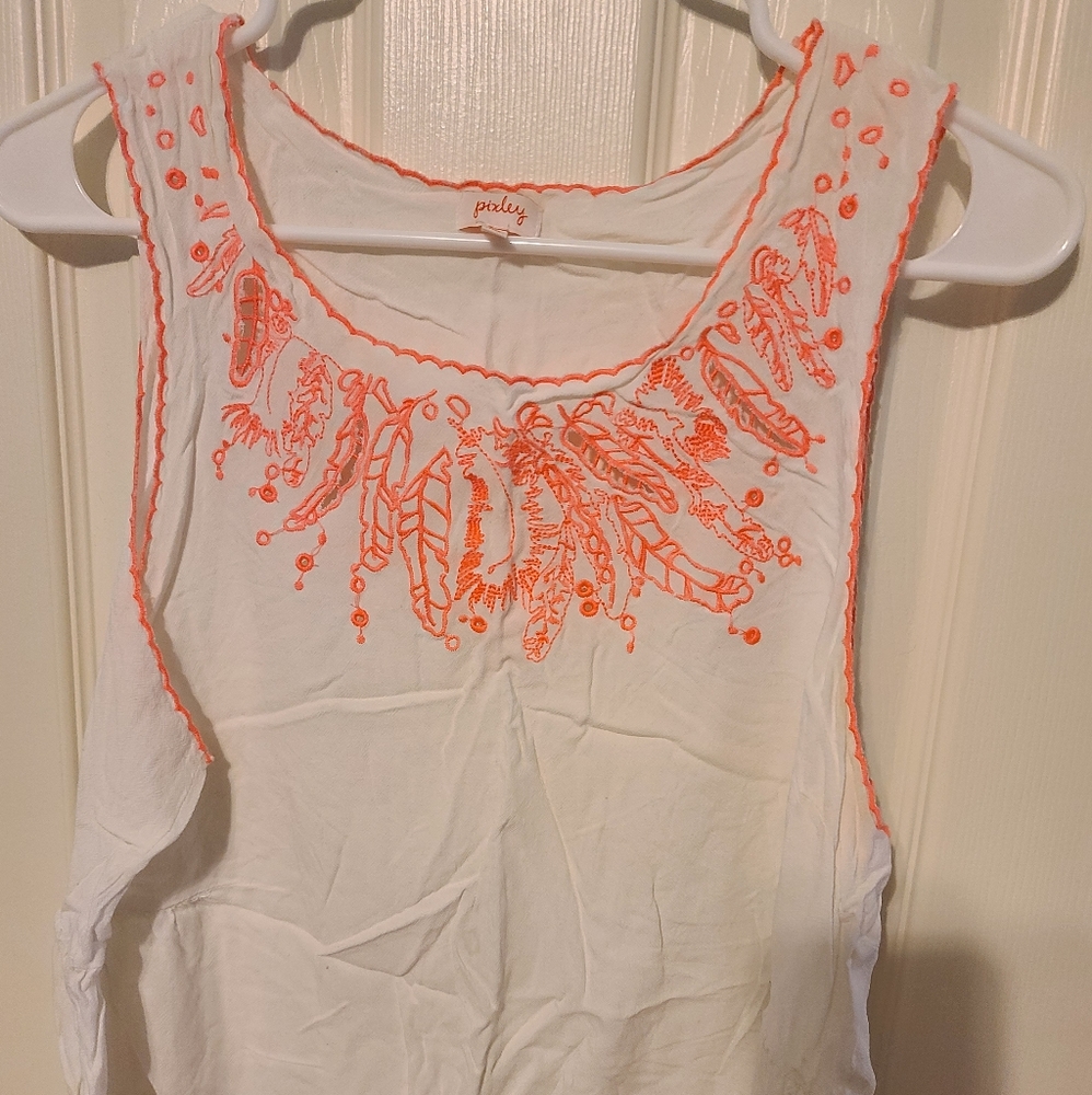 White sleeveless top